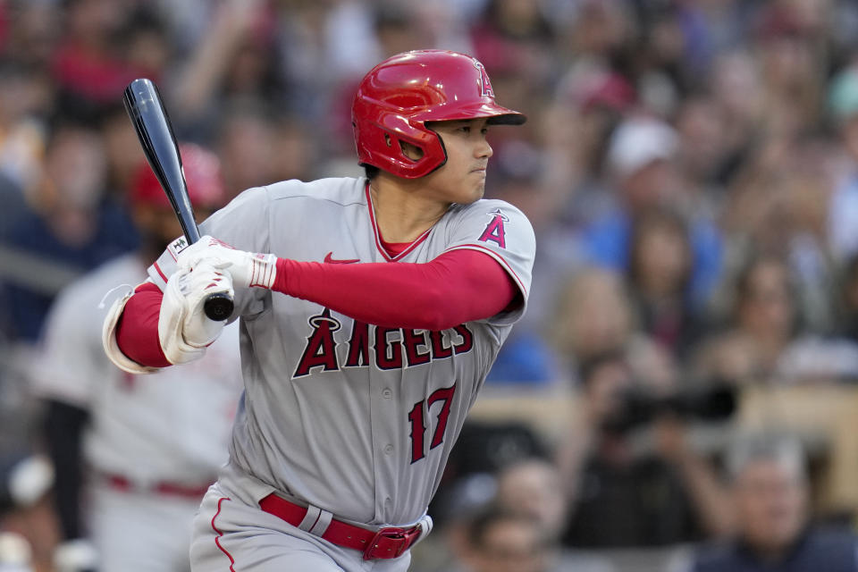 Los Angeles Angels' Shohei Ohtani watches his ground out during the fifth inning of a baseball game against the San Diego Padres, Wednesday, July 5, 2023, in San Diego. (AP Photo/Gregory Bull)