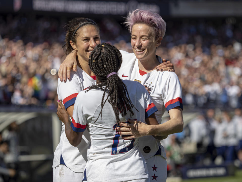 CHICAGO, IL - OCTOBER 06: The United States forward Carli Lloyd (10) reacts after scoring a goal with her teammates the United States forward Megan Rapinoe (15) and the United States defender Crystal Dunn (19) during the five-game Victory Tour between Korea Republic and United States of America on Sunday, October 06, 2019 at Soldier Field in Chicago(Photo by Joseph Weiser/Icon Sportswire via Getty Images)