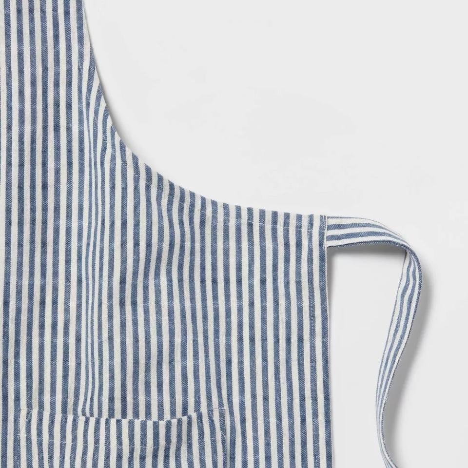 Close-up of a striped apron with a pocket