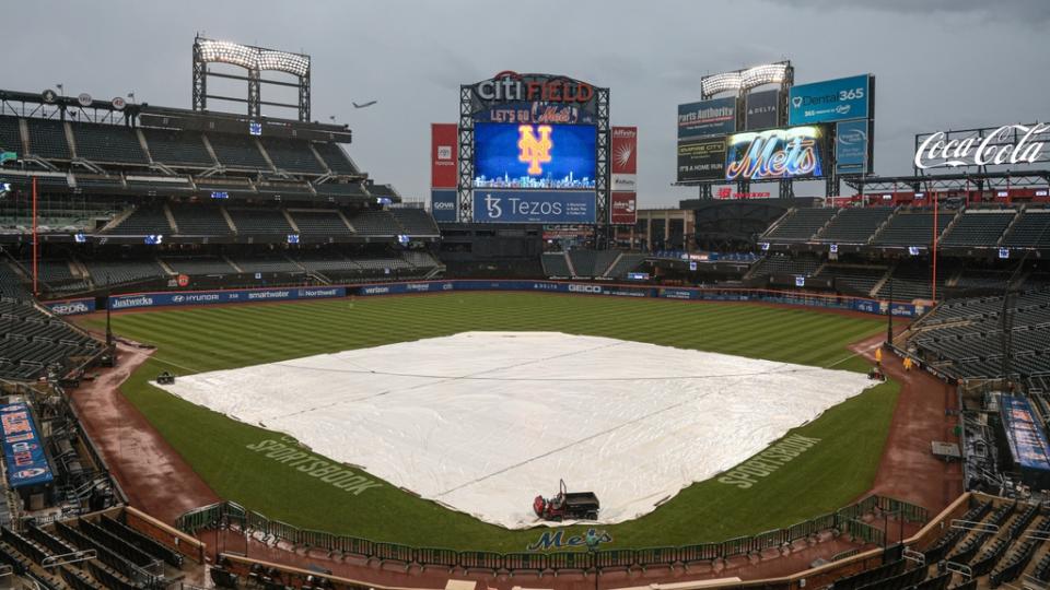 Oct 3, 2022; New York City, New York, USA; A general view of the tarp on the field before the game between the New York Mets and the Washington Nationals at Citi Field.