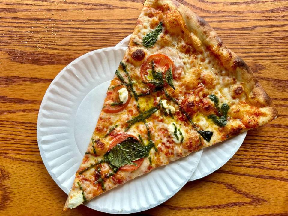 PIE.ZAA’s February specialty pizza is “Sweet Carolina,” made with fresh mozzarella, sliced tomatoes, creamy ricotta, fresh basil, nut-free pesto and a drizzle of honey.