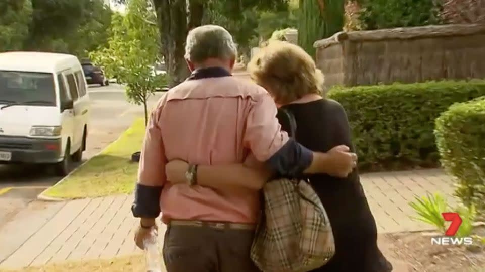 Mr Jankovic is comforted by his wife at the scene. Source: 7 News