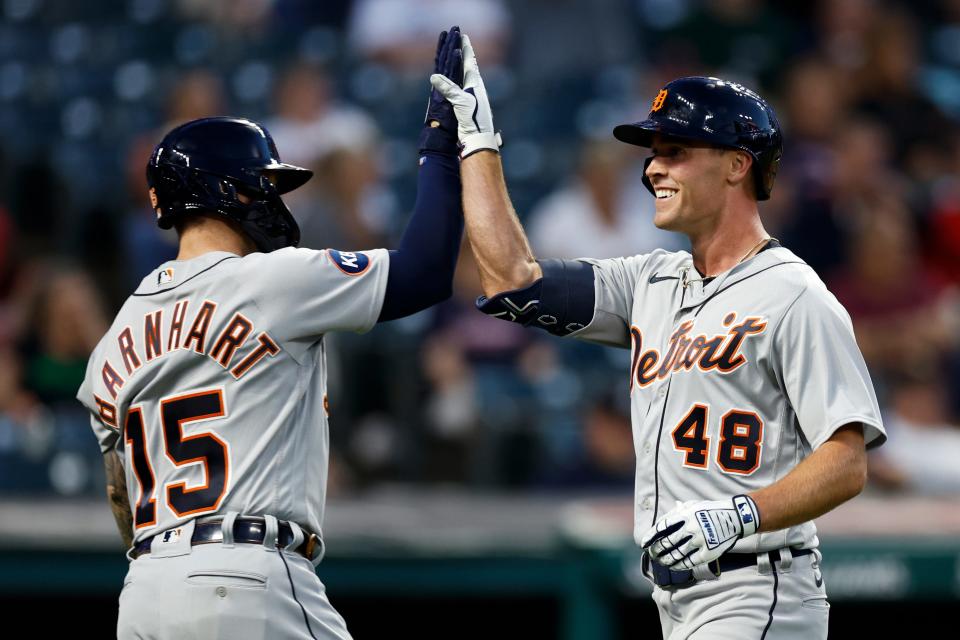 Tigers left fielder Kerry Carpenter celebrates with catcher Tucker Barnhart after hitting a solo home run off Guardians pitcher Eli Morgan during the sixth inning of the second game of a doubleheader against the Guardians on Monday, Aug. 15, 2022, in Cleveland.
