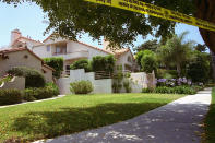 <p>Police tape surrounds the Bundy Drive home of Nicole Brown Simpson, ex-wife of former NFL great O.J. Simpson after she apparently was murdered late Sunday June 12, 1994. (Photo: Eric Draper/AP) </p>