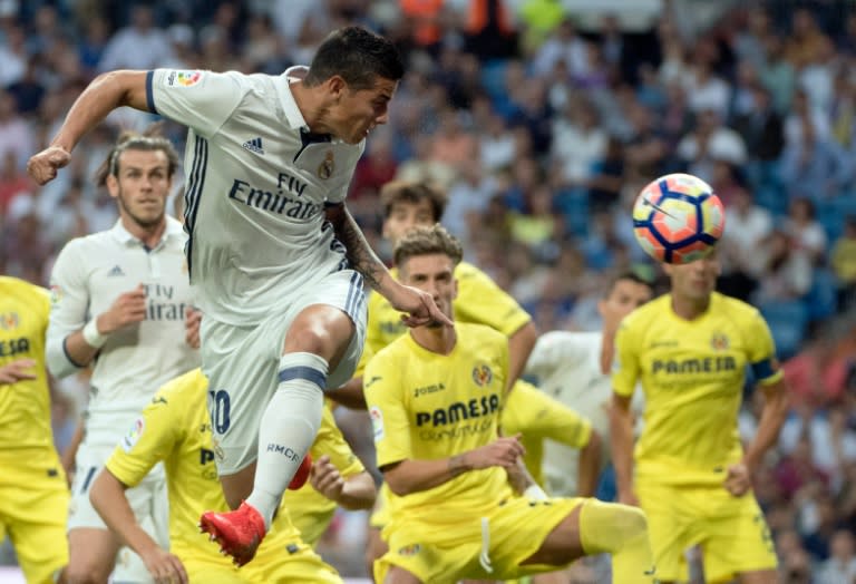 Real Madrid's James Rodriguez heads the ball during the match against Villarreal CF at the Santiago Bernabeu stadium in Madrid on September 21, 2016