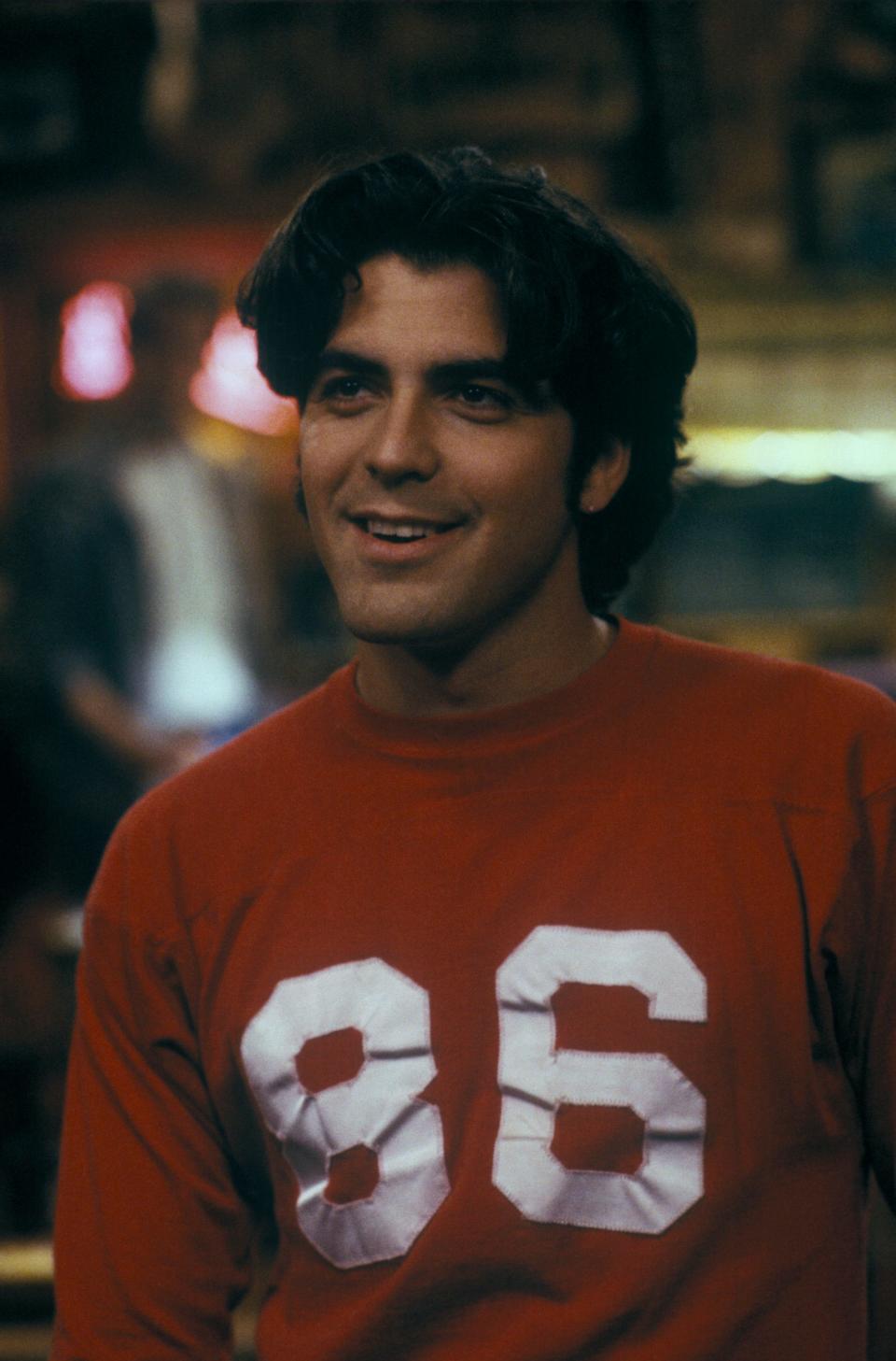 George Clooney as Booker Brooks in "Roseanne"
