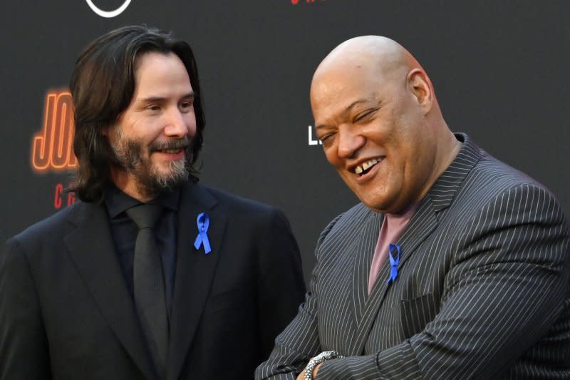 Laurence Fishburne (R) and Keanu Reeves attend the Los Angeles premiere of "John Wick: Chapter 4" in March. File Photo by Jim Ruymen/UPI