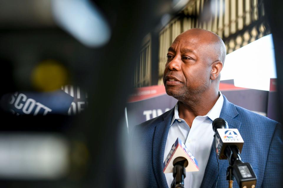 Tim Scott speaks with members of the media during a retail campaign event at Stax's Original Restaurant on Poinsette Highway in Greenville, S.C., on Monday, Oct. 9, 2023.