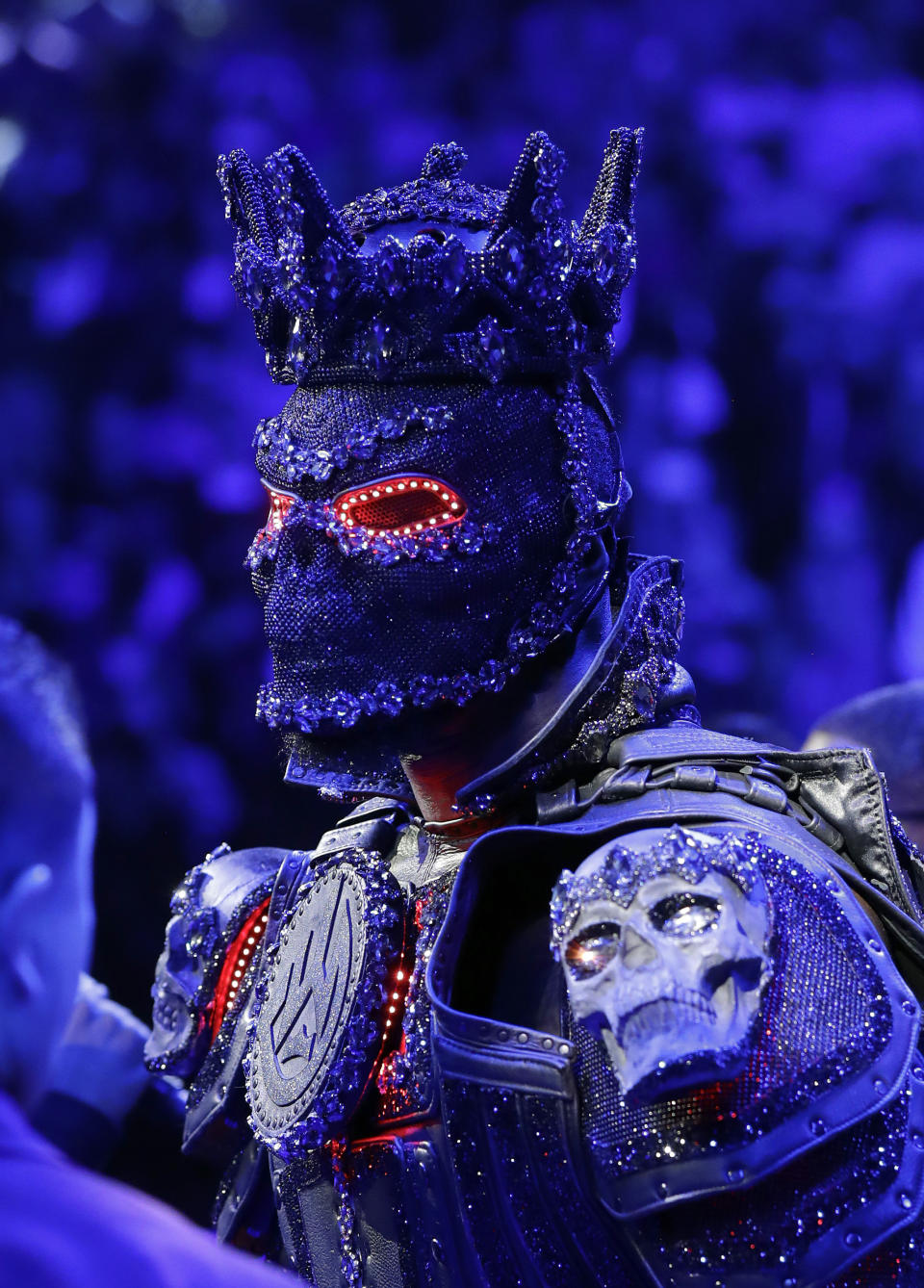 Deontay Wilder arrives in the ring for a WBC heavyweight championship boxing match against Tyson Fury, of England, Saturday, Feb. 22, 2020, in Las Vegas. (AP Photo/Isaac Brekken)