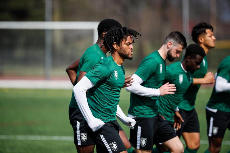 Lexington Soccer Club’s Jalen James (7) and his teammates take the field for a scrimmage this spring. The team plays its home opener April 8 in Georgetown.