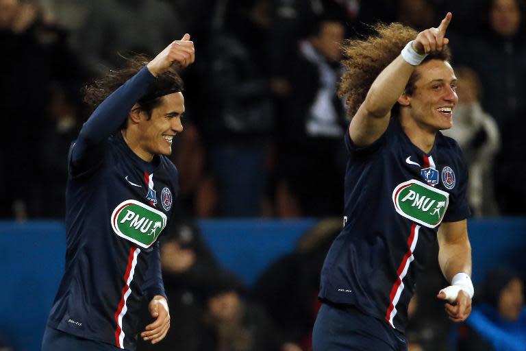 Paris Saint-Germain's Edinson Cavani (L) and David Luiz celebrate during their 2-0 win over Monaco in Paris on March 4, 2015