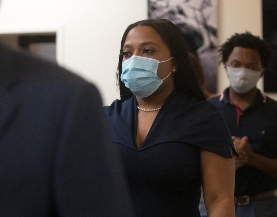 Katrina Robinson walks into a press conference following her conviction on wire fraud charges on Thursday, Sept. 30, 2021, in Memphis, Tenn.