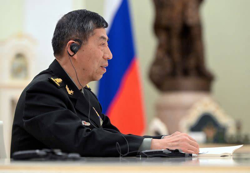 FILE PHOTO: Russian President Vladimir Putin meets Chinese Defence Minister Li Shangfu in Moscow