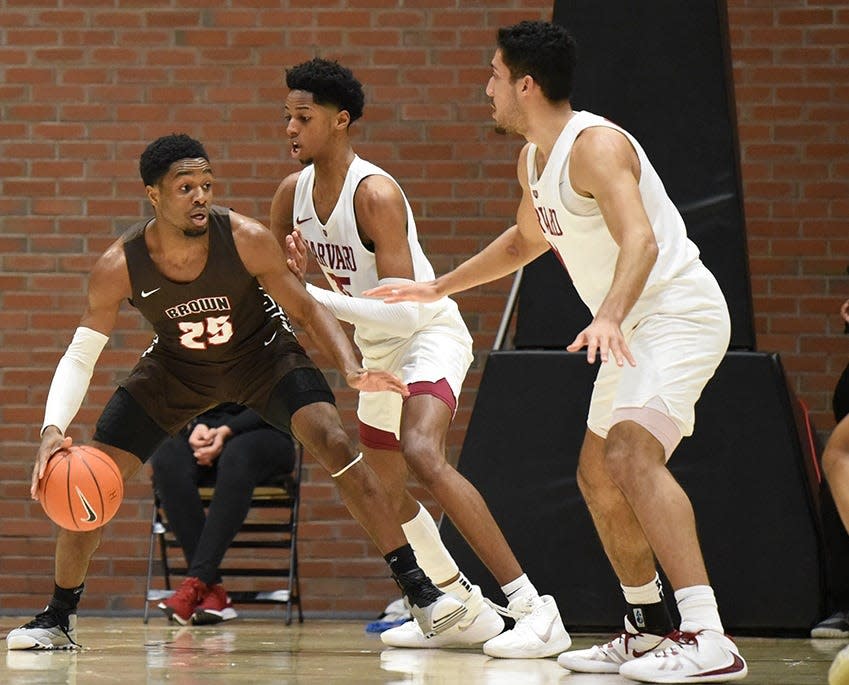 Brown's Tamenang Choh looks for an opening during a game at Harvard two years ago. Choh led the Bears with 13.2 points per game the last time they played.