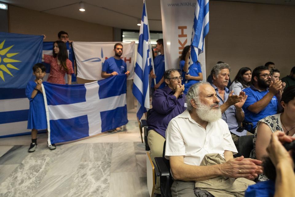 Supporters attend an election rally of Niki party, in Athens, Greece, Thursday, June 22, 2023. Three far-right and two far-left, could conceivably cross the 3% parliamentary entry threshold in Sunday's elections, despite a swing back to mainstream politicians as the scars of Greece's 10-year financial crisis gradually heal. (AP Photo/Yorgos Karahalis)