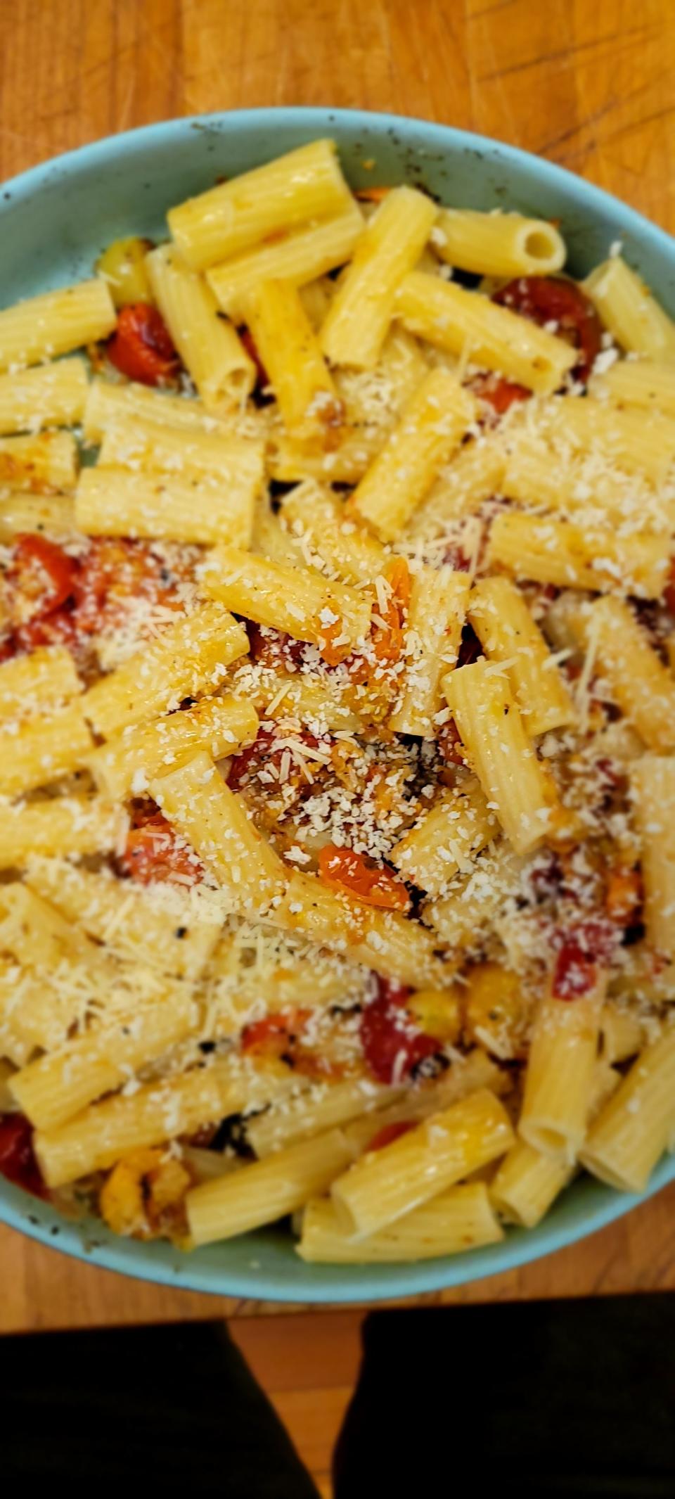 Cherry tomatoes are a perfect addition to this simple pasta dish.