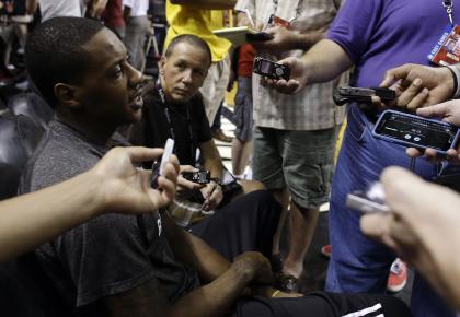 Mario Chalmers is hearing it from all sides. (AP) 