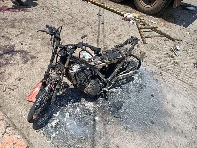 Burned motorcycle is pictured in the aftermath of an explosion in Jolo Island