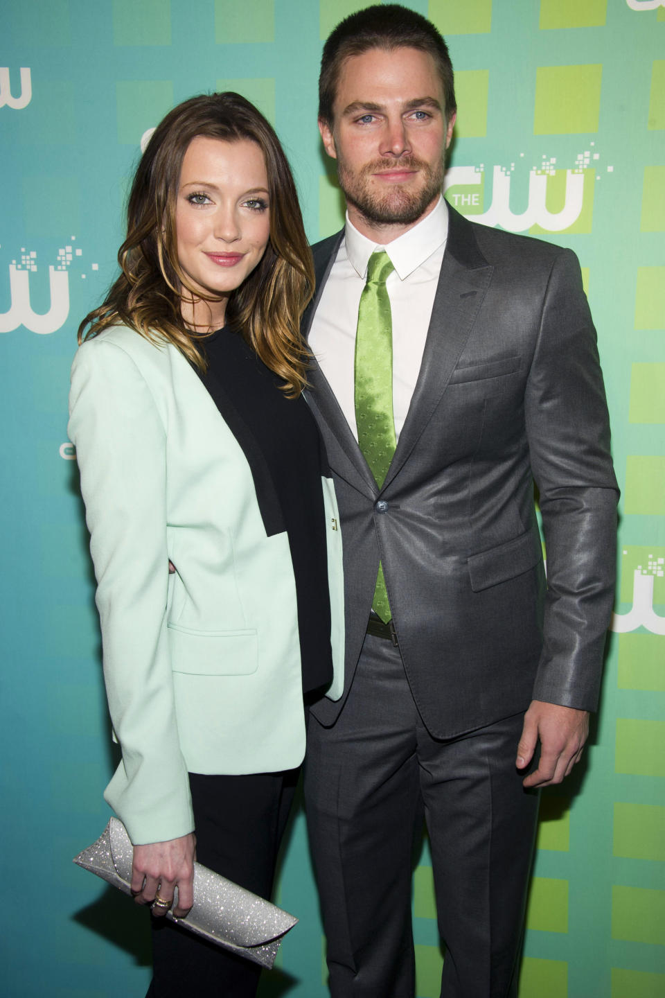 Katie Cassidy and Stephen Amell attend The CW Television Network's Upfront 2012 in New York, Thursday, May 17, 2012. (AP Photo/Charles Sykes)