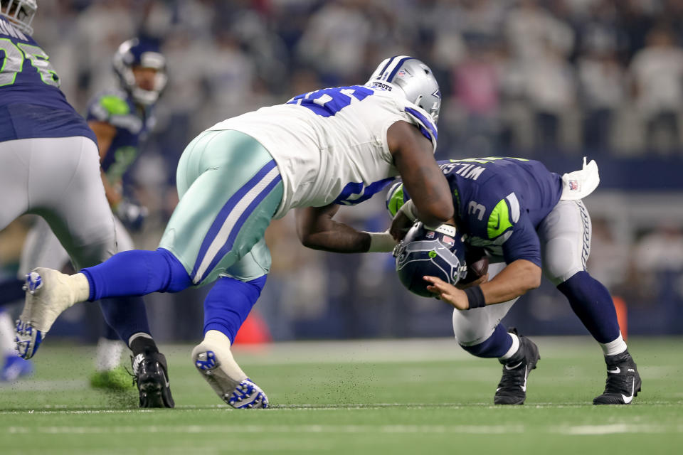 <p>Dallas Cowboys defensive tackle Maliek Collins (96) sacks Seattle Seahawks quarterback Russell Wilson (3) during the NFC wildcard playoff game between the Seattle Seahawks and Dallas Cowboys on January 5, 2019 at AT&T Stadium in Arlington, TX. (Photo by Andrew Dieb/Icon Sportswire) </p>