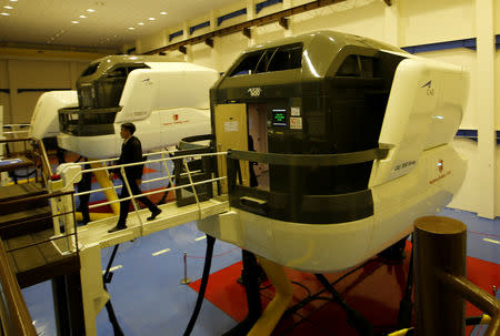 A pilot of Lion Air Group leaves an aircraft simulator after a routine practice session at Angkasa Training Center near Jakarta, Indonesia, November 2, 2018. REUTERS/Willy Kurniawan