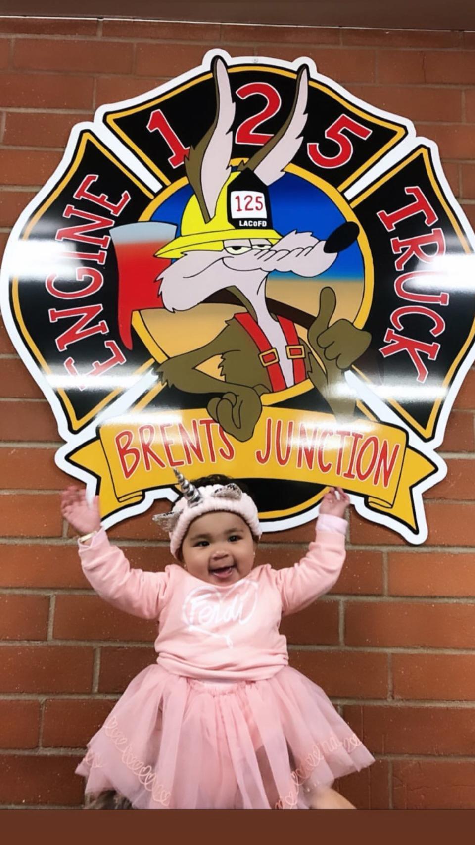 Pretty in pink! Khloé’s little girl was all smiles on their outing to thank local fire fighters for their service. The mom-of-one shared that the cousins “drew cards and brought cookies for the visit” on her Instagram post. 