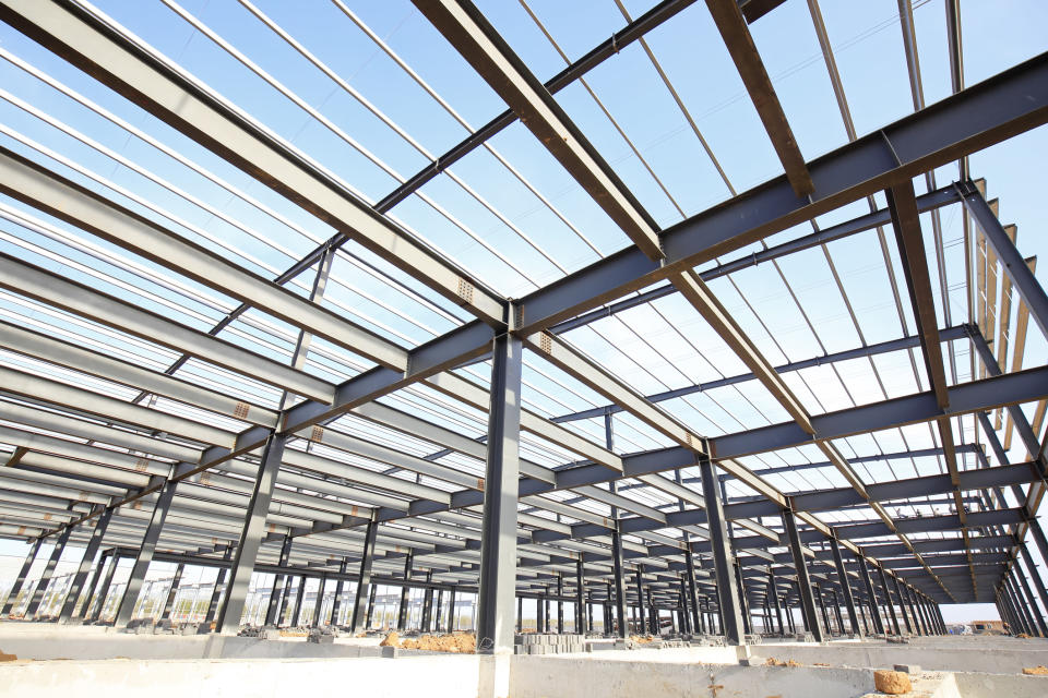 Criss-crossing beams of a steel-framed building