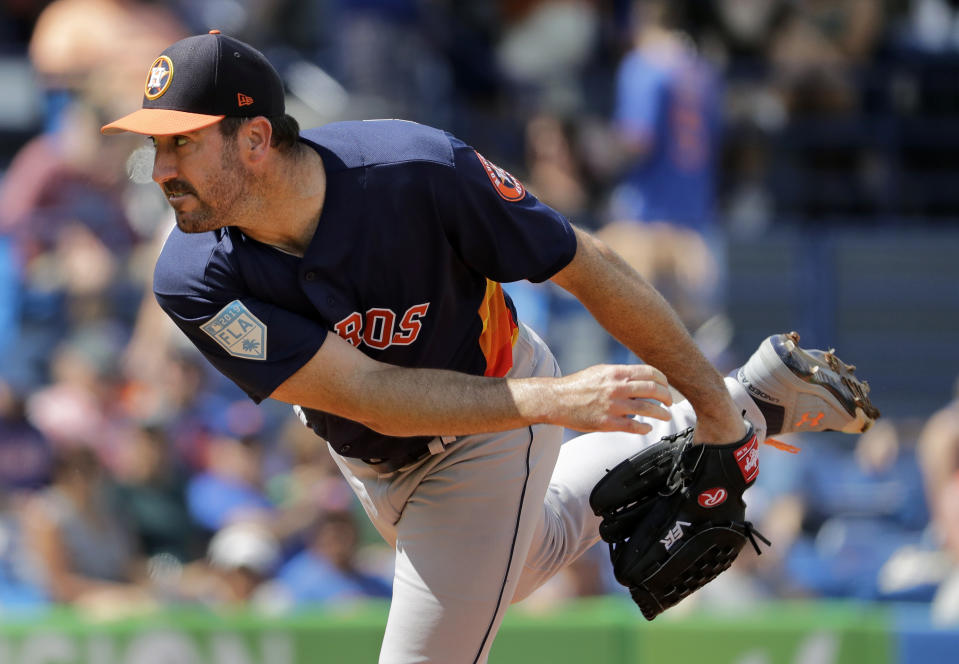 Houston Astros starting pitcher Justin Verlander throws during the first inning of an exhibition spring training baseball game against the New York Mets, Saturday, March 2, 2019, in Port St. Lucie, Fla. (AP Photo/Jeff Roberson)