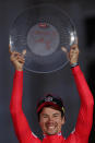 Primoz Roglic of Slovenia celebrates on the podium after winning La Vuelta cycling race in Madrid, Spain, Sunday, Sept. 15, 2019. (AP Photo/Manu Fernandez)