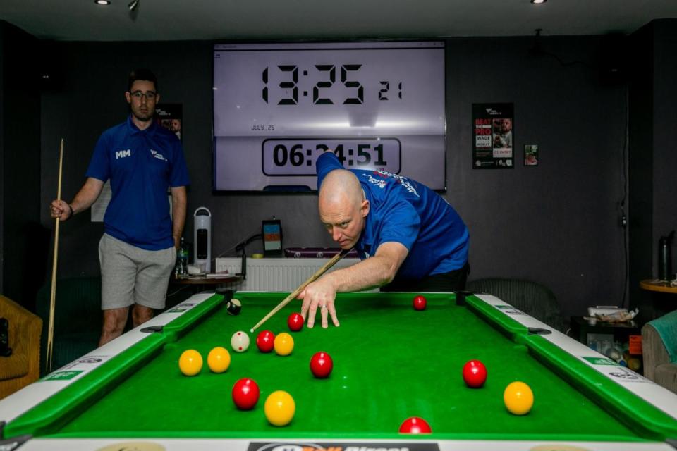 Marc Murray and Colin Pincher taking part in their charity 111 hour pool marathon at Hooch's in Consett last July. <i>(Image: SARAH CALDECOTT)</i>