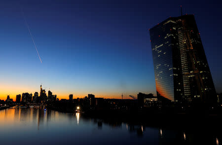 The skyline with its financial district and the head quarters of the European Central Bank (ECB,R) is photographed on early evening in Frankfurt, Germany, October 5, 2018. REUTERS/Kai Pfaffenbach