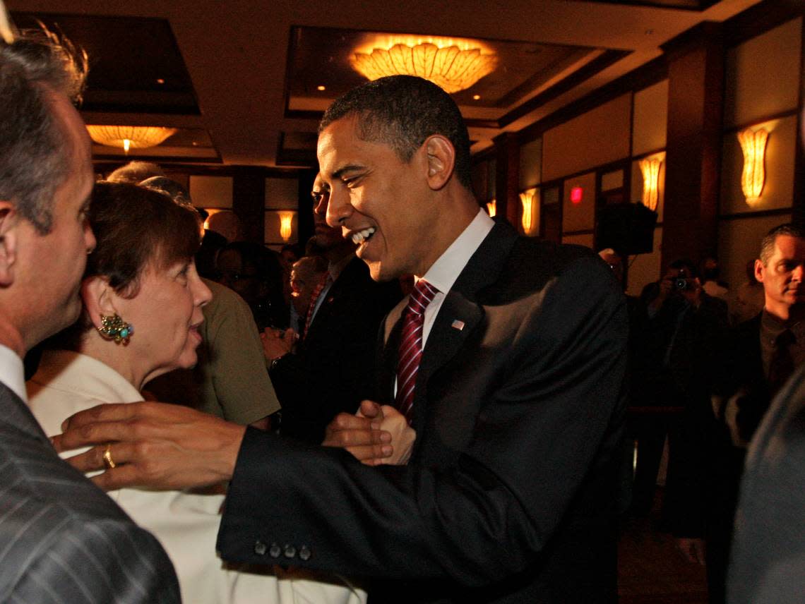 U.S. Sen. Barack Obama greets Adrienne Arsht at an event celebrating Cuban Independence Day at the InterContinental Miami on May 23, 2008. AL DIAZ/MIAMI HERALD