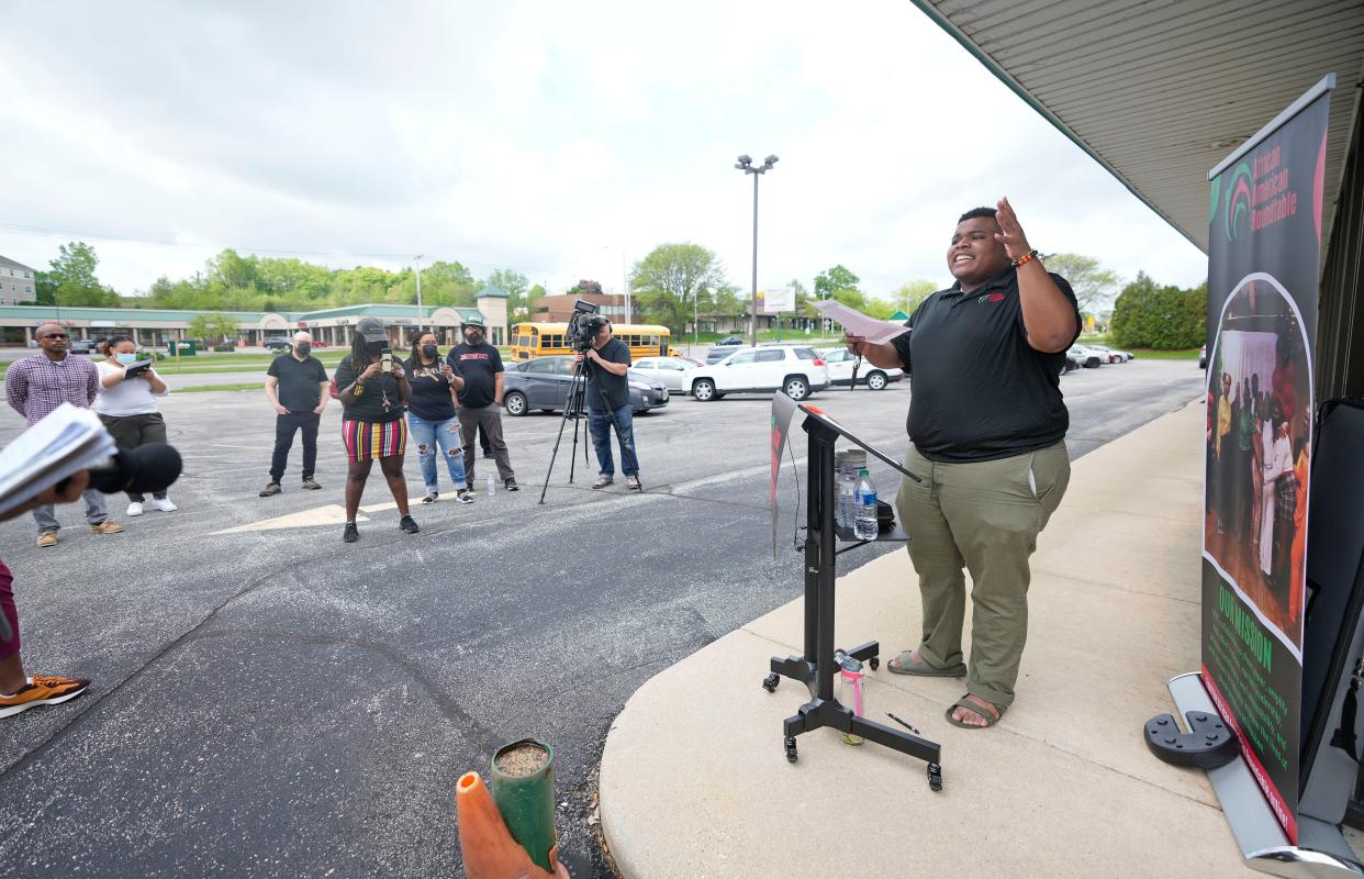 Devin Anderson, African American Roundtable membership and coalition manager, speaks during a rally to demand input on how the city of Milwaukee spends American Rescue Plan Act funds at the group's office on Thursday.