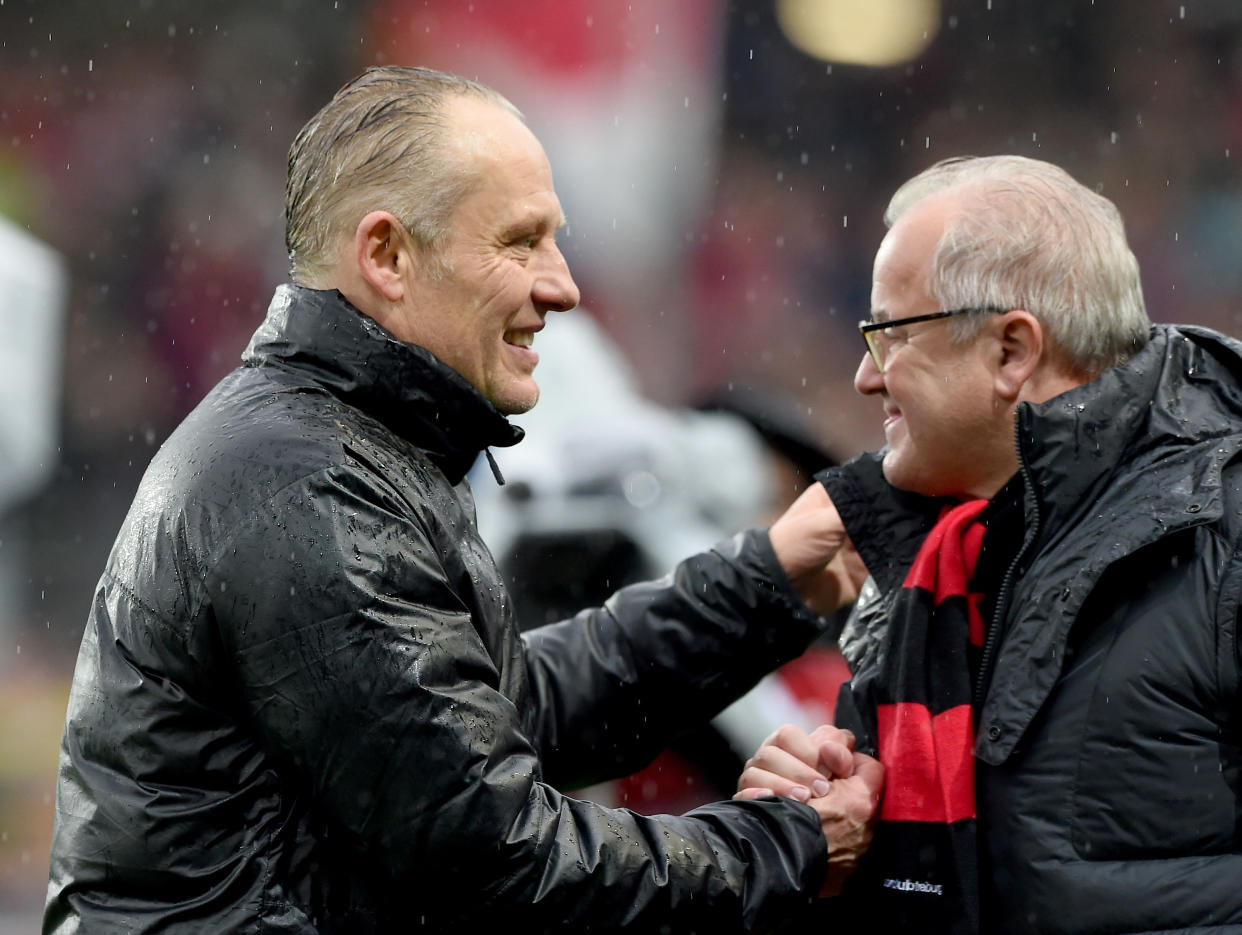 FREIBURG GERMANY - APRIL 4: Headcoach Christian Streich (L) and President Fritz Keller of SC Freiburg celebrates after the Bundesliga match between Sport Club Freiburg and 1. FC Koeln at Schwarzwald-Stadium on April 4, 2015 in Freiburg, Germany.  (Photo by Michael Kienzler/Bongarts/Getty Images)