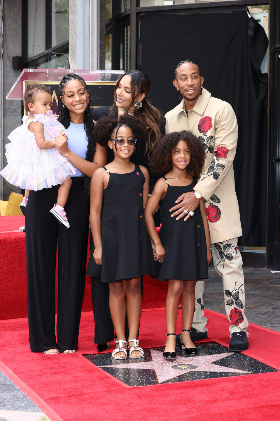 Ludacris with wife and daughters