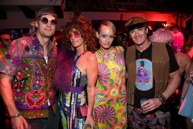 Lisa Rinna Recreates JLo's Versace Dress Moment at Halloween Party –  Footwear News
