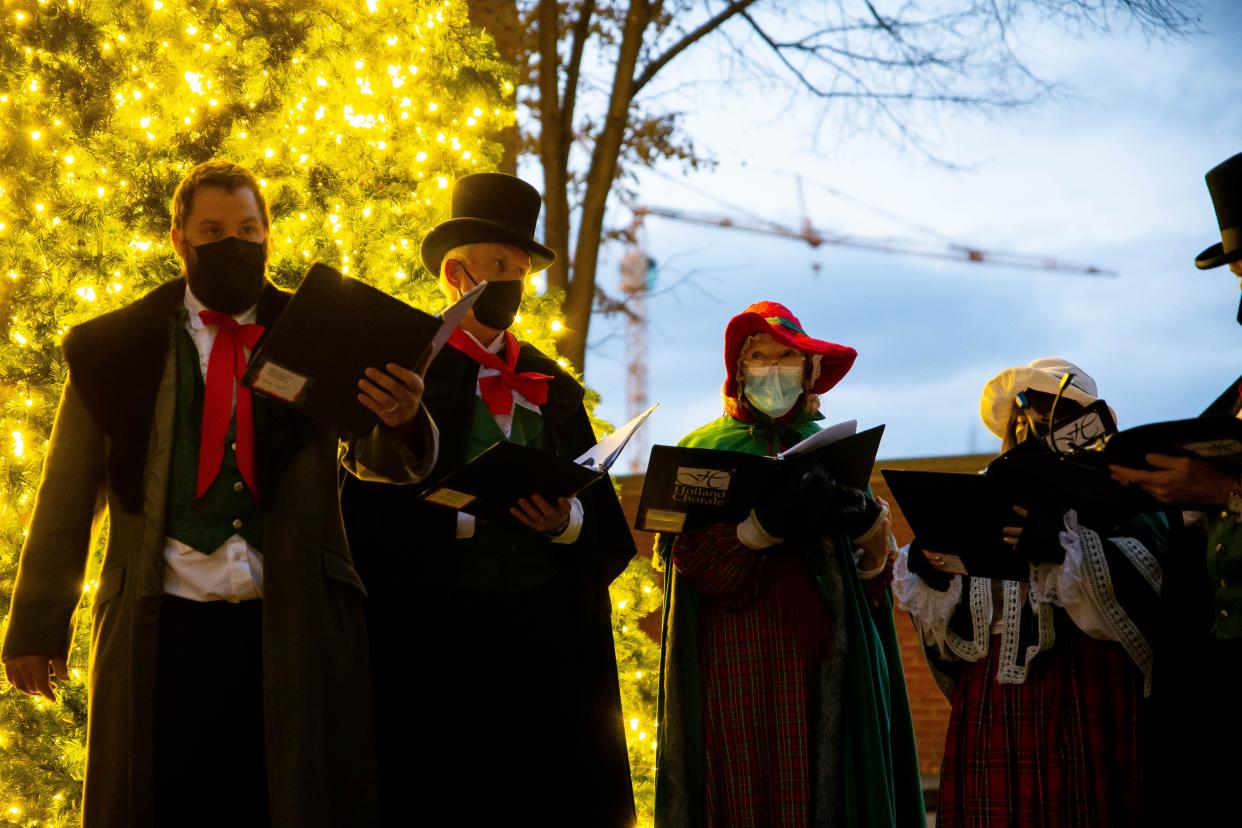 Carolers sing during Holland's Holiday Open House on Saturday, Nov. 20, 2021.