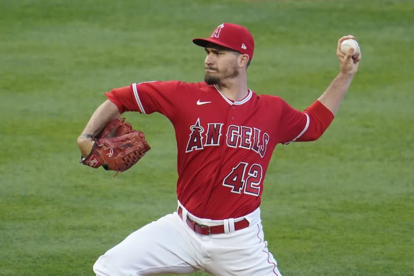 Los Angeles Angels starting pitcher Andrew Heaney throws to the Minnesota Twins.