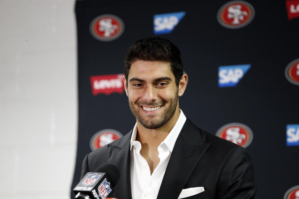 San Francisco quarterback Jimmy Garoppolo was all smiles after winning his first start with the 49ers. (AP)