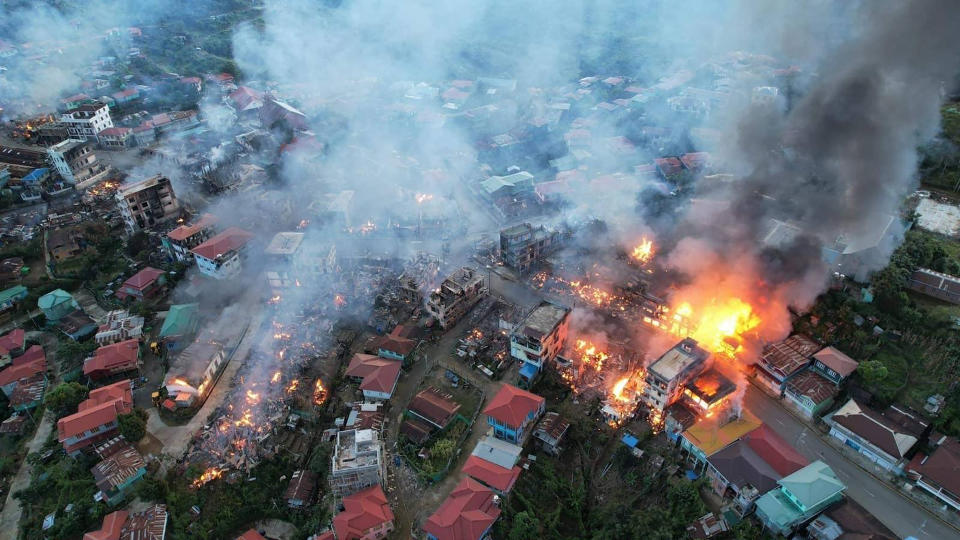 In this photo released by the Chin Human Rights Organization, fires burn in the town of Thantlang in Myanmar's northwestern state of Chin, on Friday Oct. 29, 2021. More than 160 buildings in the town in the northwestern Myanmar, including three churches, have been destroyed by fire caused by shelling by government troops, local media and activists reported Saturday. (Chin Human Rights Organization via AP)