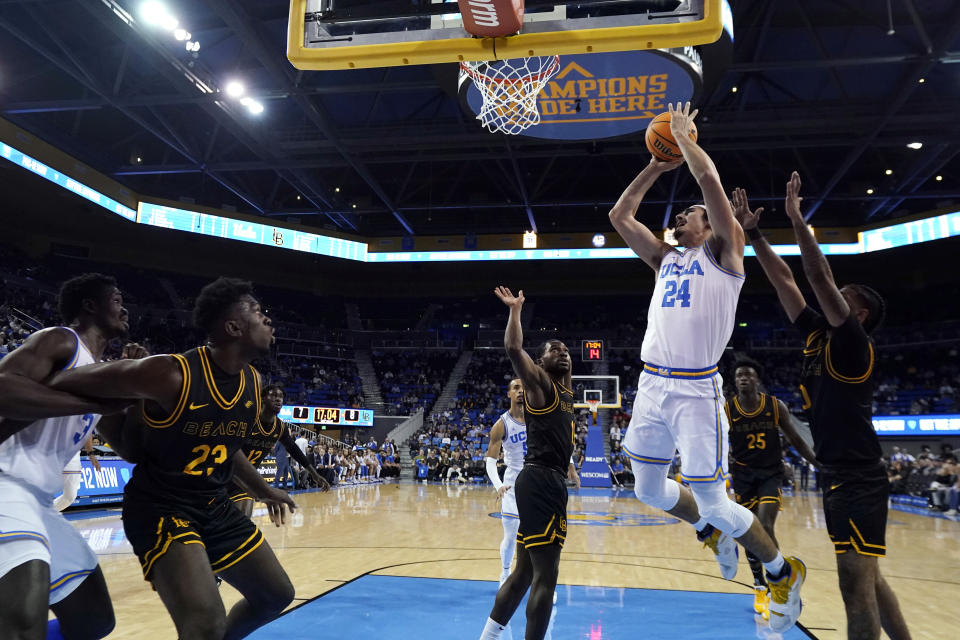 UCLA guard Jaime Jaquez Jr. (24) shoots against Long Beach State during the first half of an NCAA college basketball game Friday, Nov. 11, 2022, in Los Angeles. (AP Photo/Marcio Jose Sanchez)