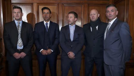 Former footballers (L-R) Mark Williams, Andy Woodward, Steve Walters, Jason Dunford and Matt Monaghan pose for a photograph after a news conference at the launch of The Offside Trust, an independent group set up to support players and their families who have suffered abuse, in Manchester northern England December 5, 2016. REUTERS/Phil Noble