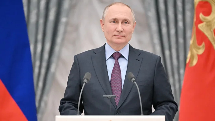 Russian President Vladimir Putin speaks to the media at the Kremlin.