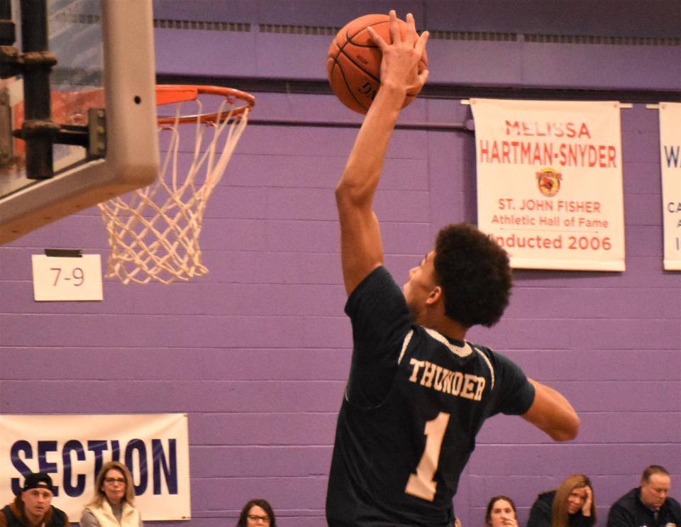 Luis Reitz attempts a dunk for Central Valley Academy Wednesday during the second half of a holiday tournament game against Sauquoit Valley at West Canada Valley.