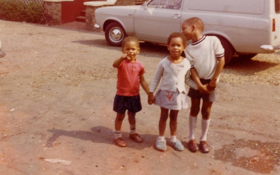  Skin, born Deborah Anne Dyer, with her brothers, Maurice and Beavon