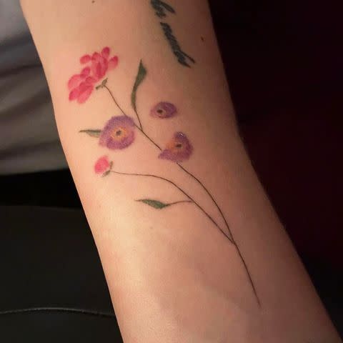 <p>Busy Philipps/Instagram</p> Busy Philipps' flower tattoo.