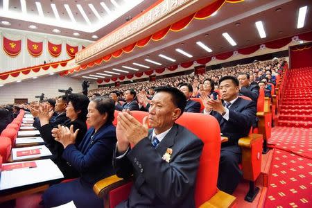 Participants clap during the Workers' Party Congress in Pyongyang, North Korea, in this photo taken by Kyodo May 9, 2016. Kyodo/via REUTERS