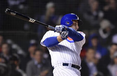 Apr 23, 2019; Chicago, IL, USA; Chicago Cubs first baseman Anthony Rizzo (44) hits a two run home run against the Los Angeles Dodgers in the second inning at Wrigley Field. Mandatory Credit: Quinn Harris-USA TODAY Sports