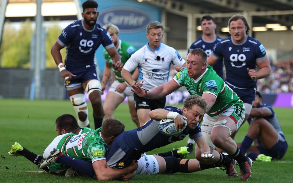 Gus Warr of Sale Sharks dives over for their first try during the Gallagher Premiership Rugby match between Sale Sharks and Leicester Tigers