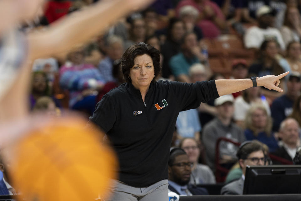 Miami coach Katie Meier directs the offense against Villanova during the second half of a Sweet 16 college basketball game in the women's NCAA Tournament in Greenville, S.C., Friday, March 24, 2023. (AP Photo/Mic Smith)